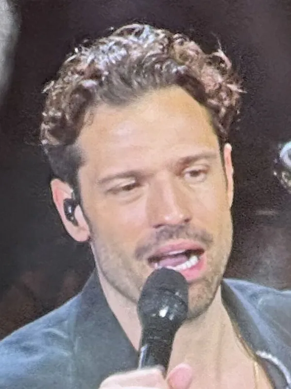 Konstantinos Argiros performing on stage