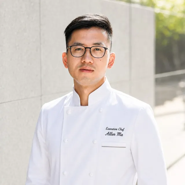 Executive Chef Allen Ma of Sei Less in his white chef's coat