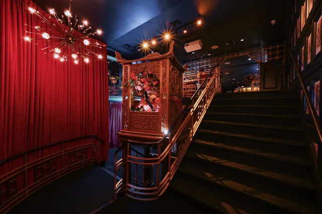 The illuminated staircase at Sei Less